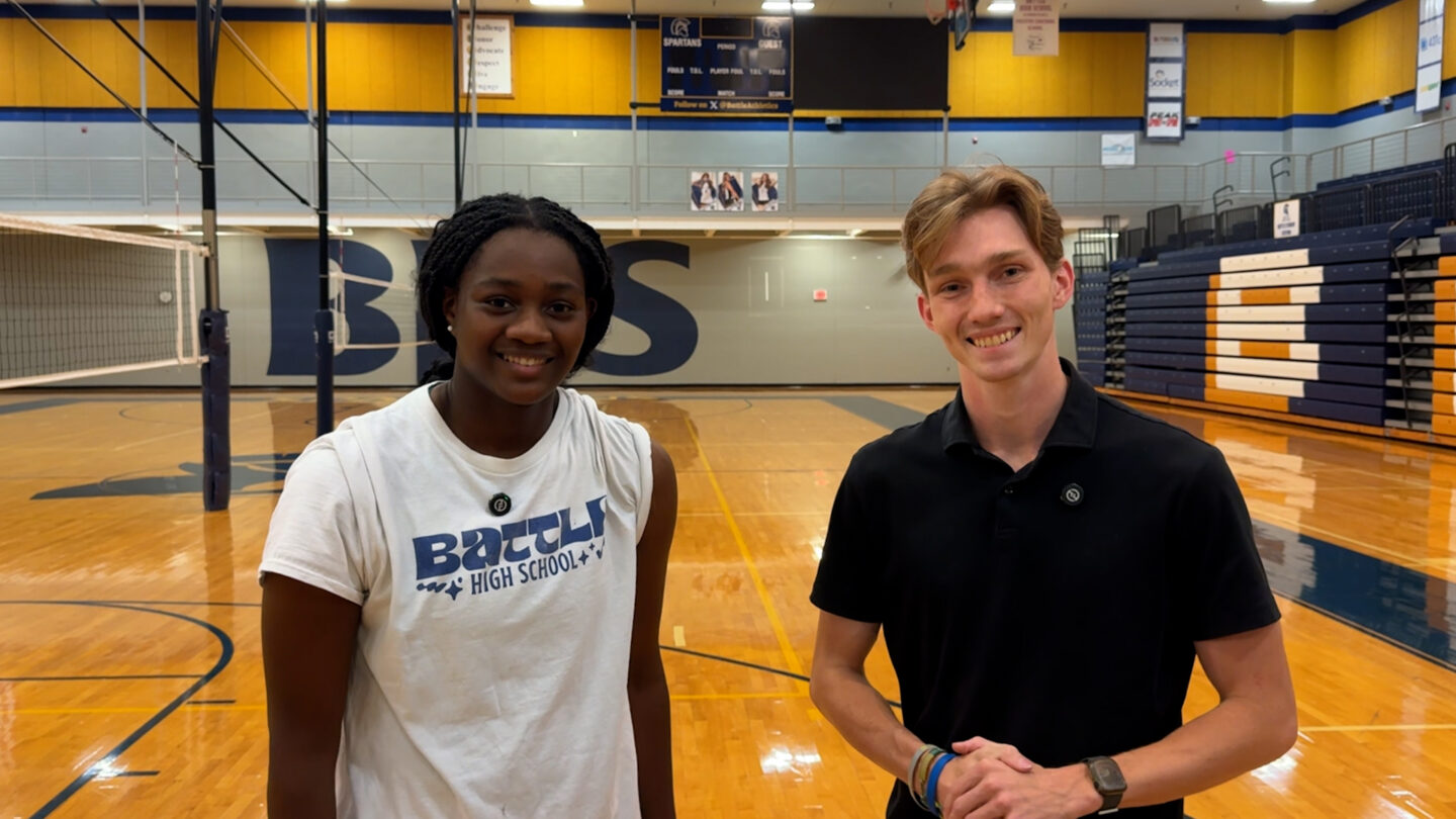 Battle volleyball blocker Nadine Ira (left) with ABC 17's Collin Anderson.